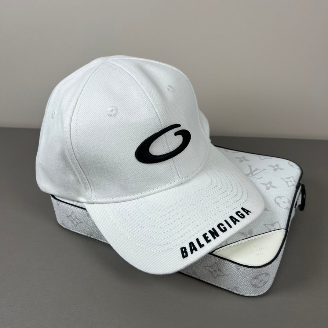 White cotton cap with graphic emblem and contrast brim embroidery
