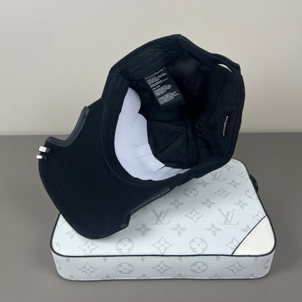 Black cotton cap with flame embroidery and notched brim