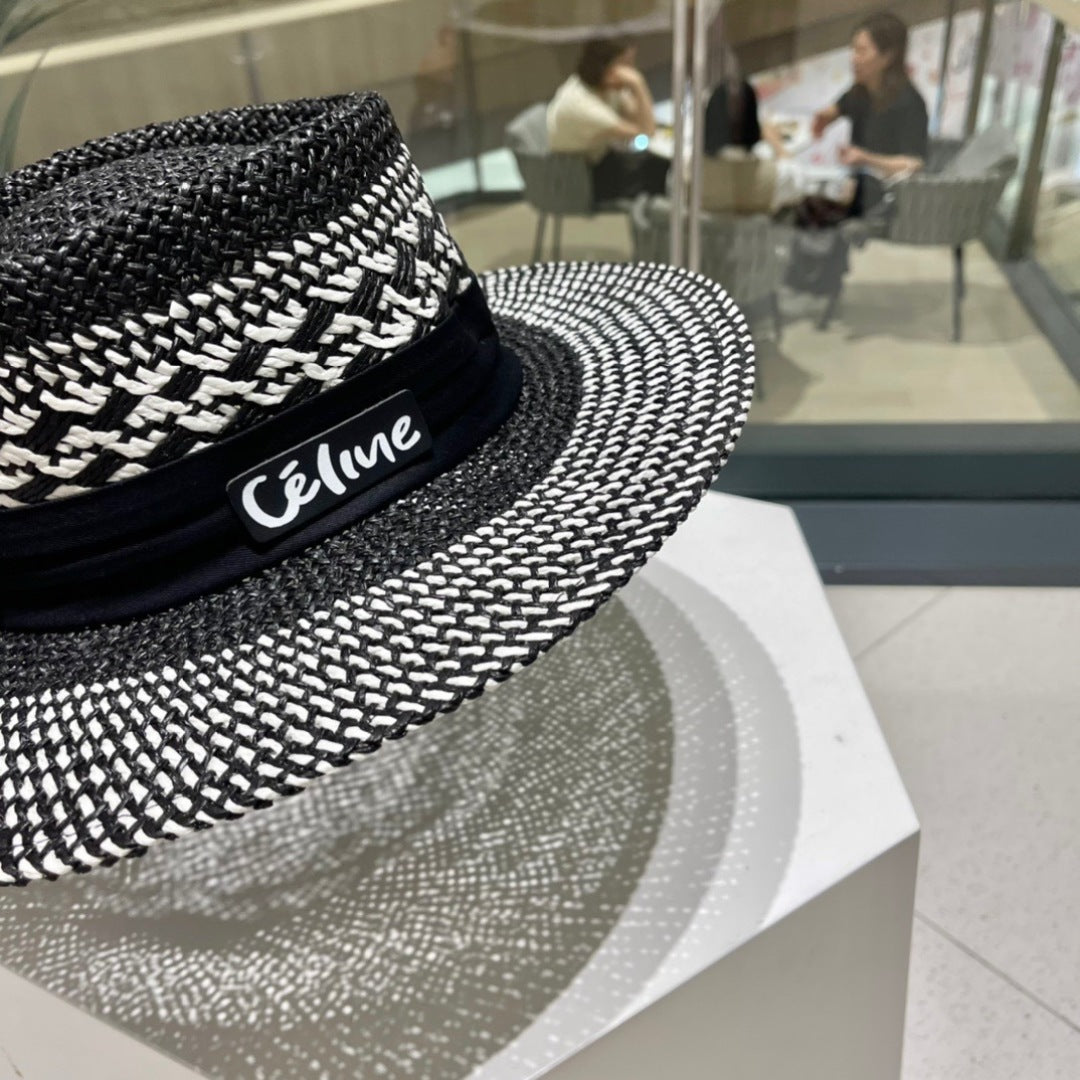 CELINE WIDE BRIM HAT MODEL 652048 IN BLACK AND WHITE WOVEN STRAW
