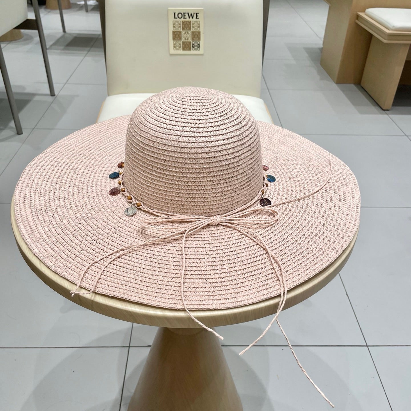 CELINE WIDE BRIM HAT MODEL 652184 IN LIGHT PINK WOVEN STRAW