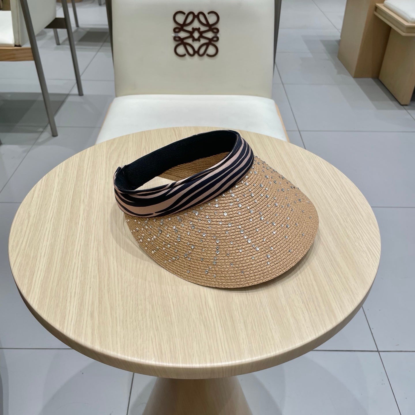 CELINE VISOR HAT MODEL 652214 IN NATURAL WOVEN STRAW