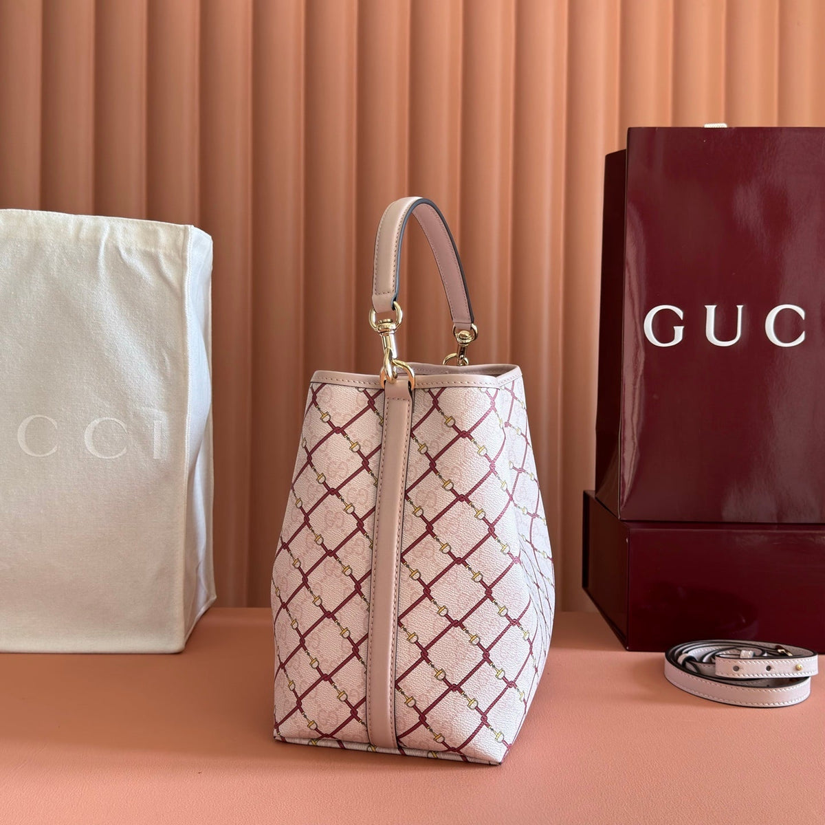 GUCCI 26S  EMBLEM BUCKET BAG 25 IN LIGHT PINK COATED FABRIC