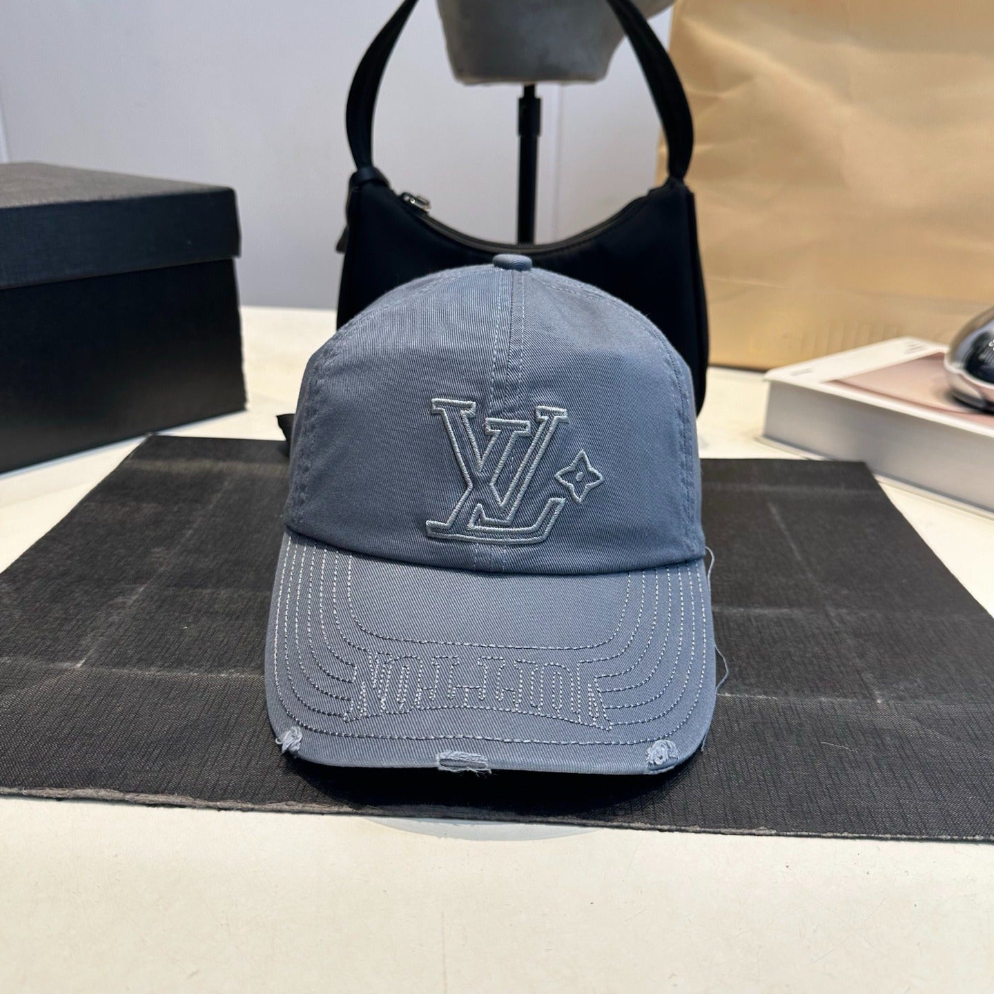 Distressed Denim Baseball Cap with Embroidered Monogram — Washed Blue